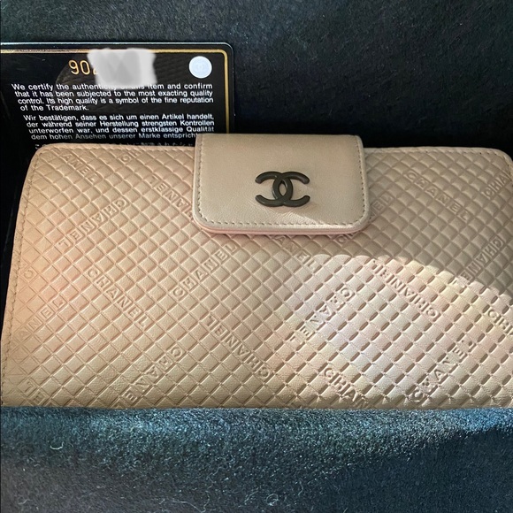 CHANEL Handbags - Chanel Embossed Leather Wallet **EXTREMELY RARE**